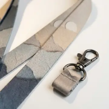 Paper Cut Crossbody Strap, close-up of the finish